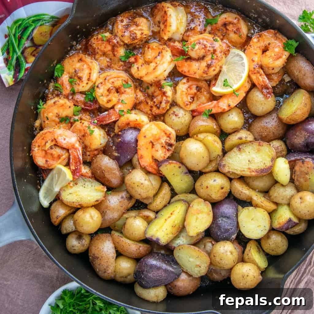 Golden Honey Mustard Shrimp and Crispy Potatoes 10 shrimp and potatoes in skillet