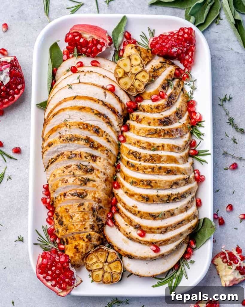 Tender Maple Glazed Boneless Turkey Breast 10 top shot of sliced turkey breasts with pomegranate garnishes