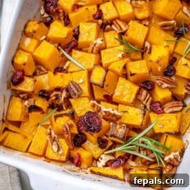 top view of roasted butternut squash in white dish