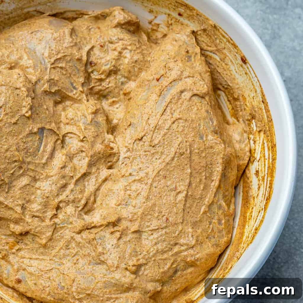 Flavorful Tandoori Chicken Made Easy 5 Raw chicken breasts in spiced yogurt marinade