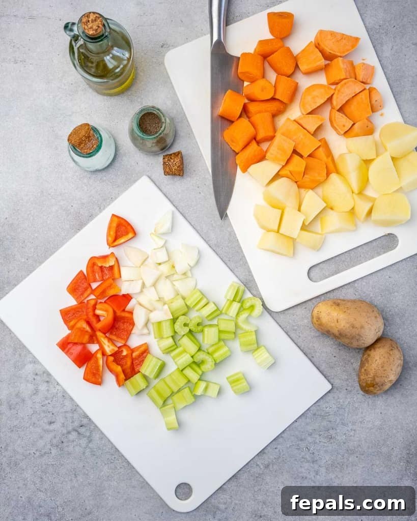 Velvety Chicken Stew 5 chopped veggies for chicken stew on a cutting board