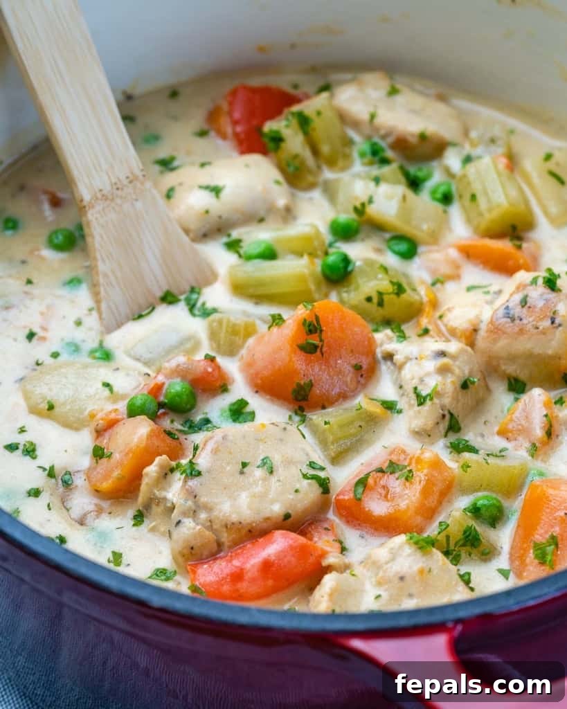 Velvety Chicken Stew 9 side shot of chicken stew in a pot