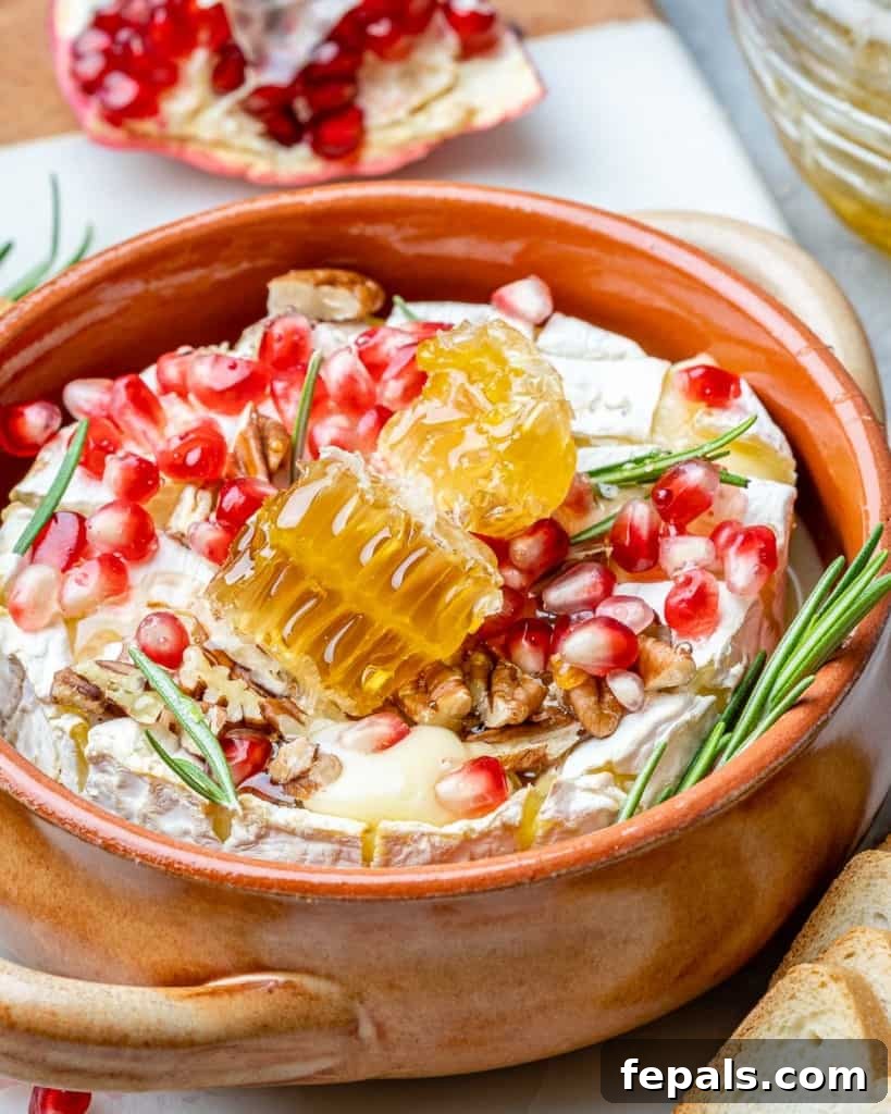 Warm Brie with Jewels of Pomegranate 3 side shot of baked brie in brown bowl