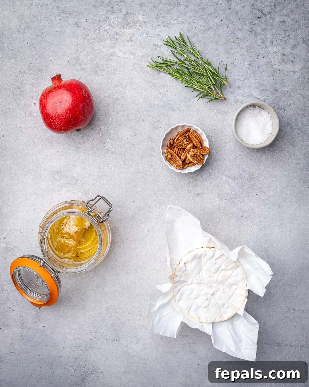 Warm Brie with Jewels of Pomegranate 4 Ingredients for baked brie on counter