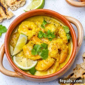 top view shrimp curry in brown bowl