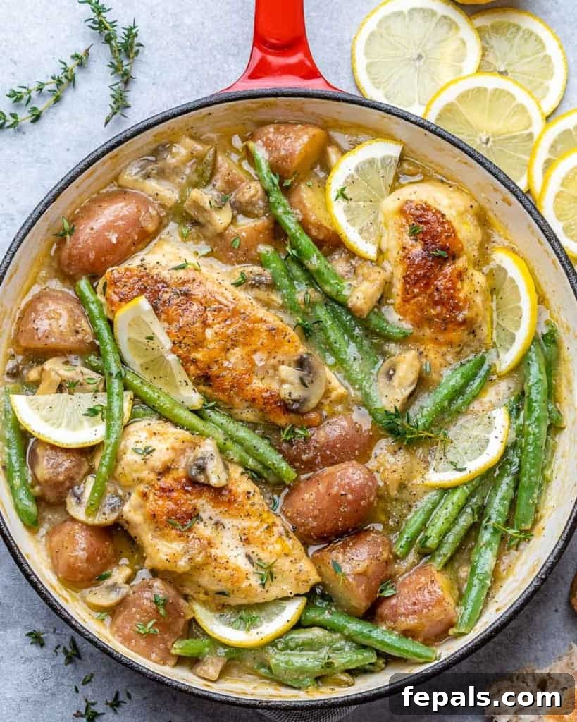 top view chicken skillet with potatoes and green beans