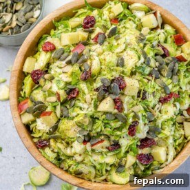 top view of brussel sprouts salad in a brown bowl
