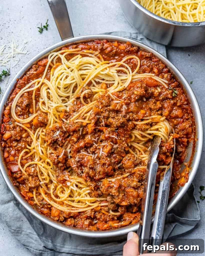 Hearty Beef Bolognese 2 Bolognese with pasta in a pan.