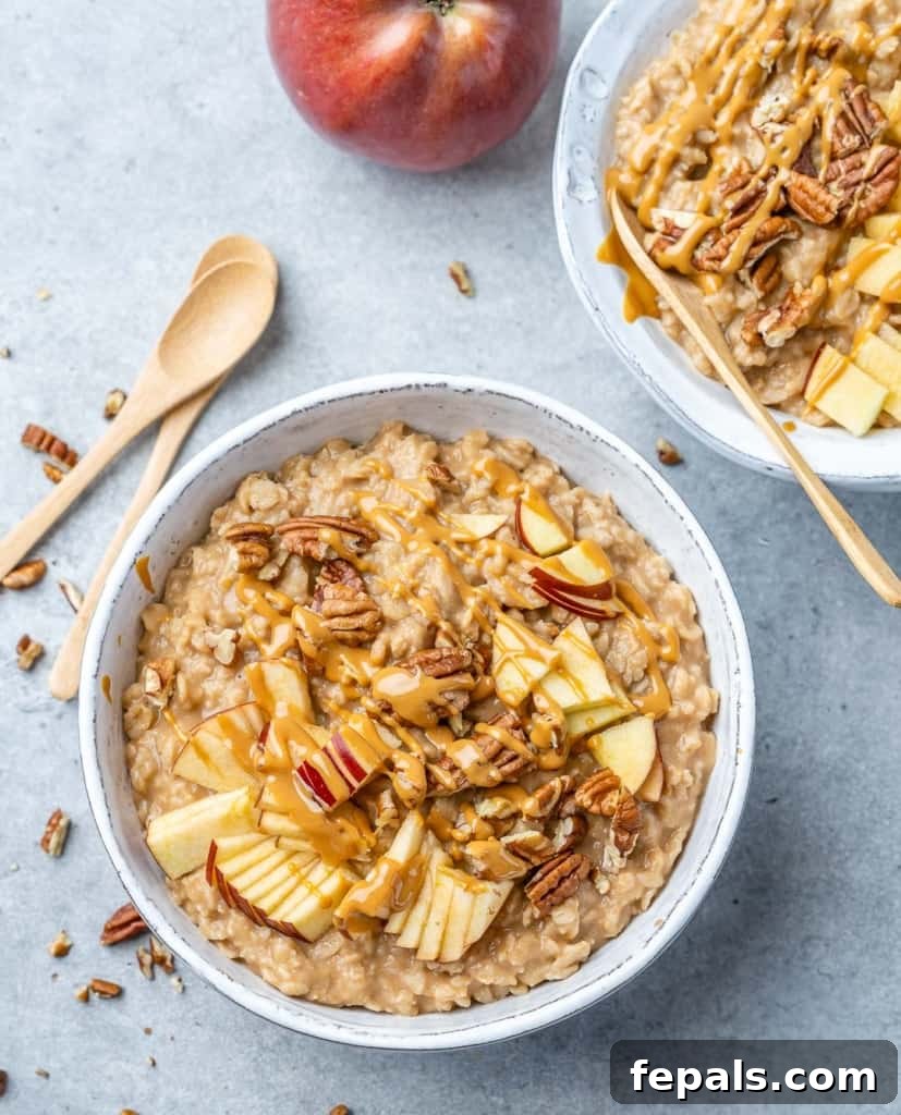 Nutty Oatmeal Morning Fuel 3 top view of oatmeal in a white bowl with banana and pecan toppings