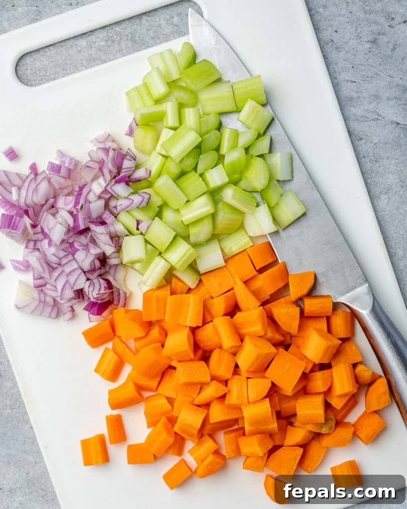 Diced vegetables cut into uniform pieces, ready for cooking.