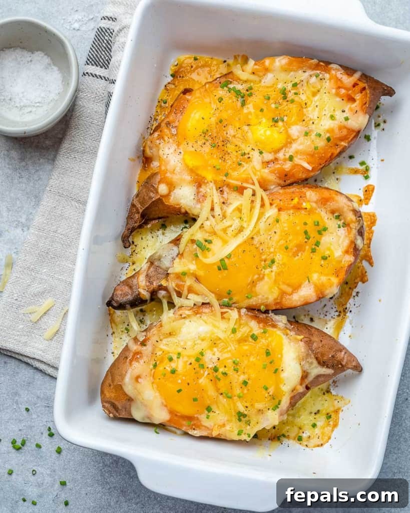 Sweet Potato Sunrise 7 Top down shot of baked sweet potatoes in a white baking dish.