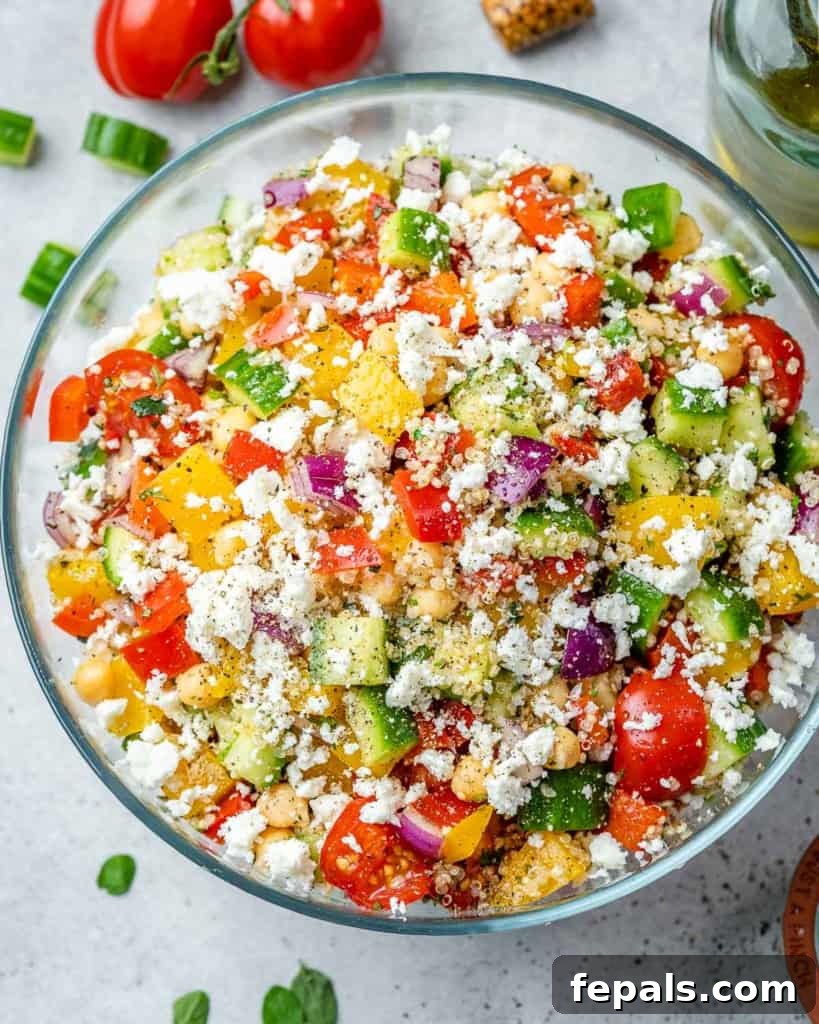 Vibrant Chickpea Quinoa Salad 2 top view quinoa salad in a clear bowl