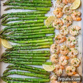 Roasted Garlic Shrimp & Asparagus Sheet Pan Dinner 11 top view sheet pan of shrimp and asparagus