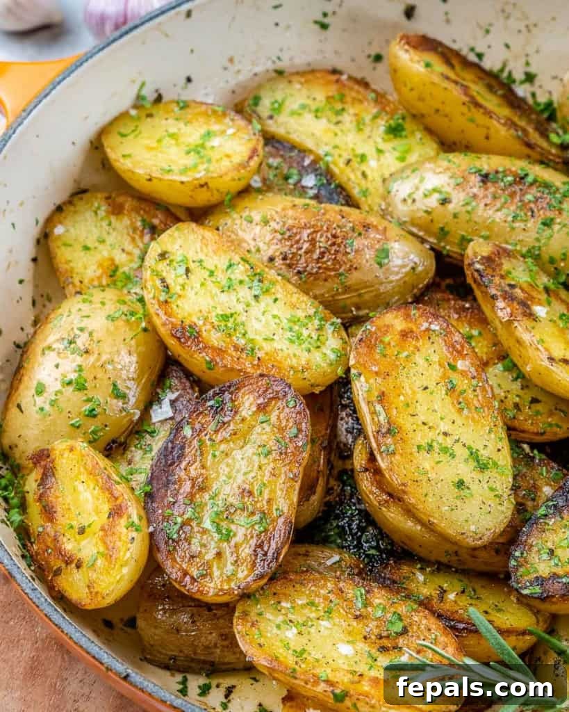 Crispy Garlic Skillet Potatoes 8 Another top view of a skillet filled with golden, crispy pan-roasted baby potatoes.