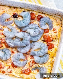creamy feta base with raw shrimp over creamy sauce