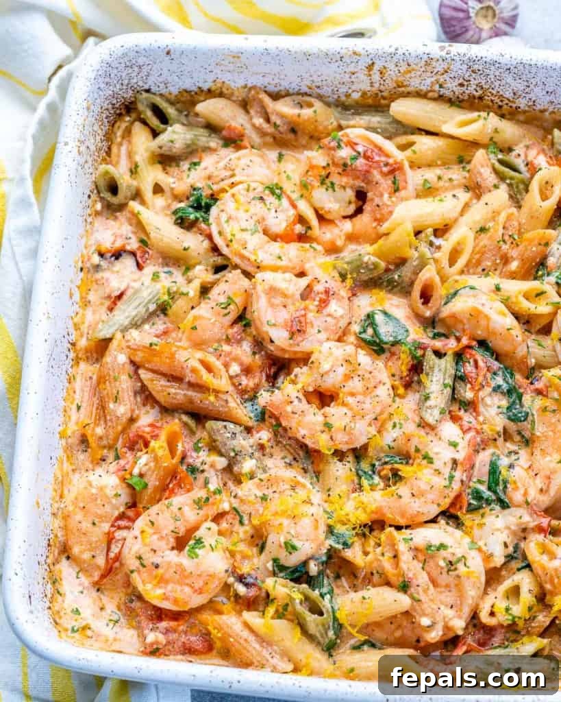 white dish of baked feta pasta with shrimp