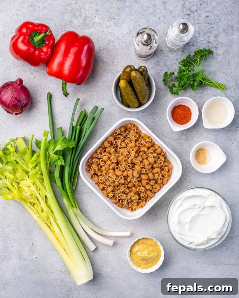 Grandma's Simple Macaroni Salad 4 top view of various fresh ingredients for macaroni salad on a cutting board