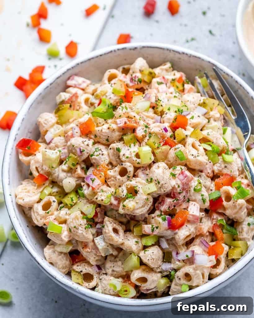 Grandma's Simple Macaroni Salad 7 top view of classic macaroni salad in a white bowl, ready to serve