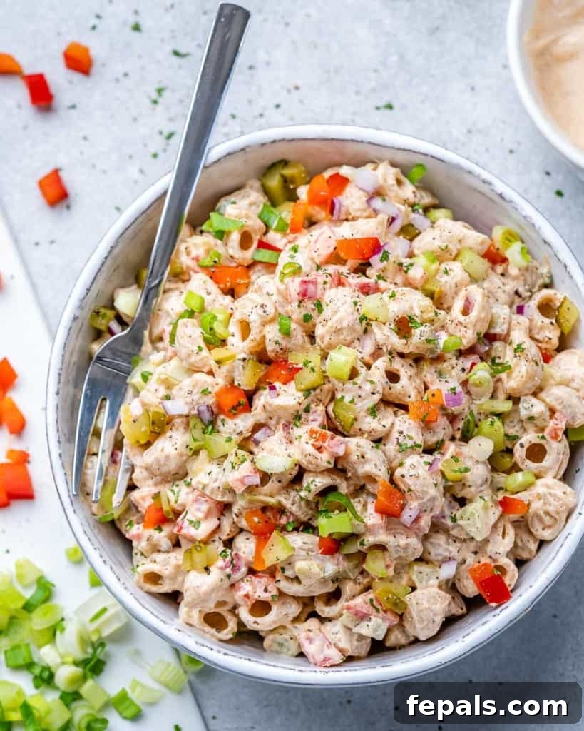 Grandma's Simple Macaroni Salad 10 close up top view of creamy macaroni salad with colorful vegetables