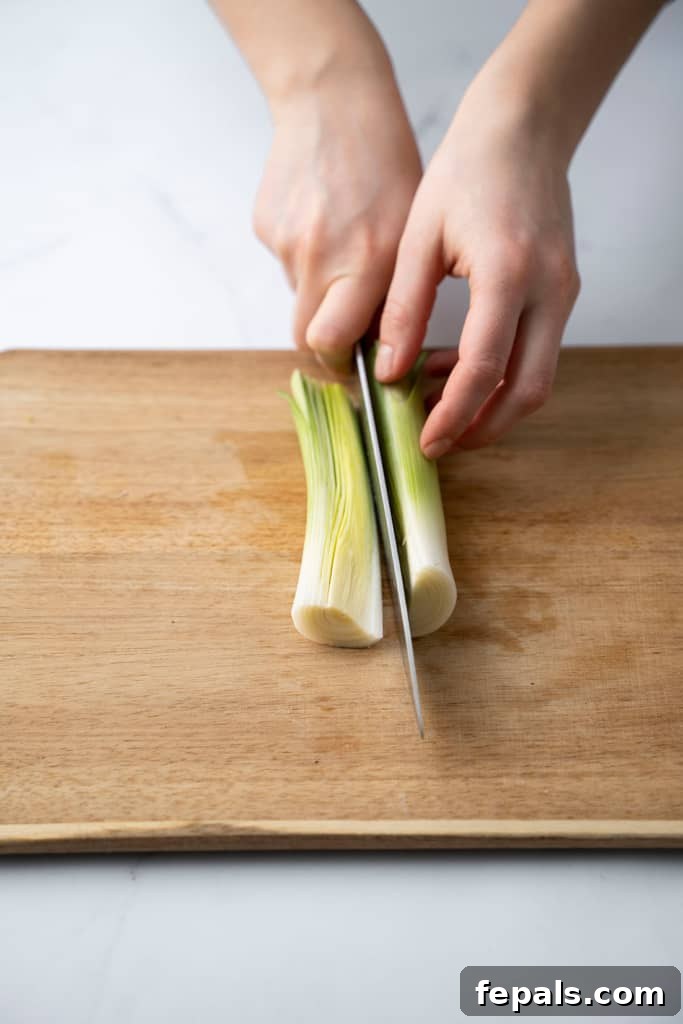 Mastering Leek Slicing 6 Leek cut in half.