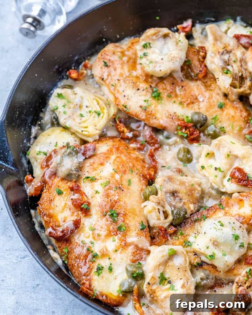 Zesty Mediterranean Skillet Chicken 12 side shot of chicken in a creamy lemon sauce with artichoke
