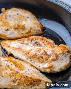 top view of chicken in skillet