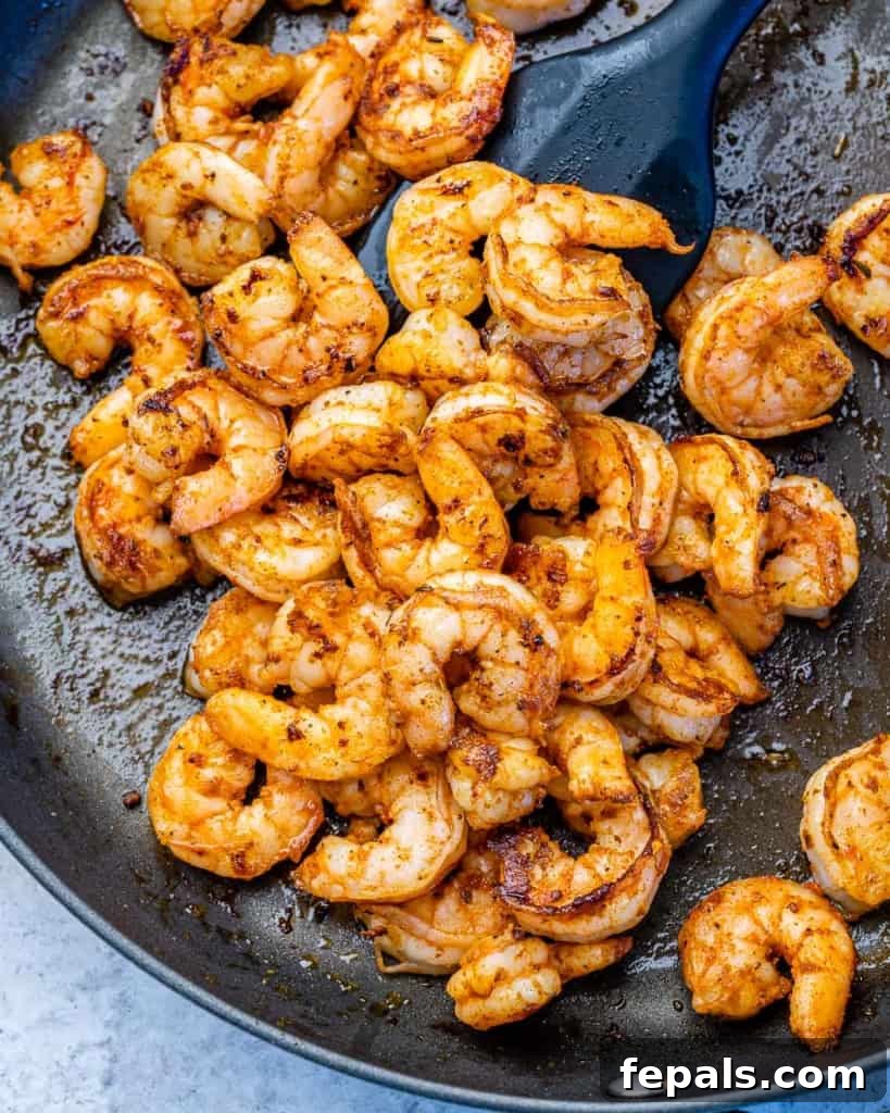 sauteed cajun shrimp on pan