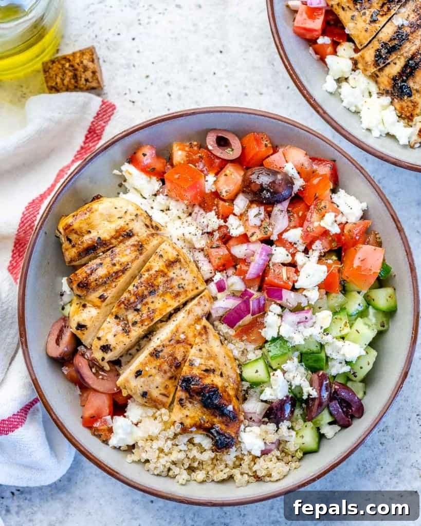 Mediterranean Grilled Chicken Power Bowl 9 One bowl filled with chicken and vegetables with quinoa