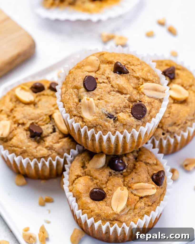 muffins stacked on one another on a plate