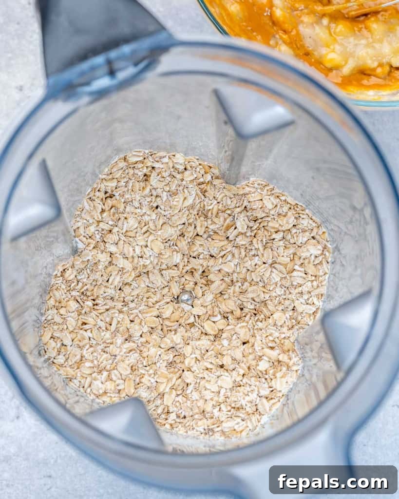 oats in blender, being coarsely ground for the cookie dough