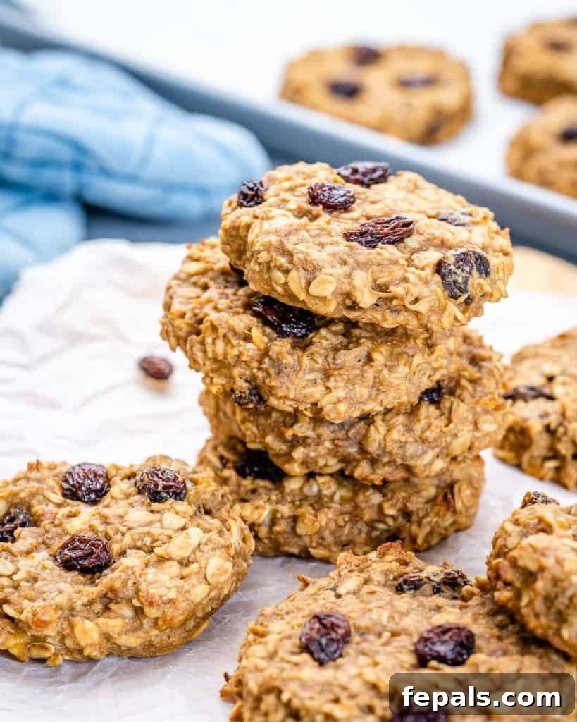 oatmeal raisin cookies stacked, showing their soft and chewy texture