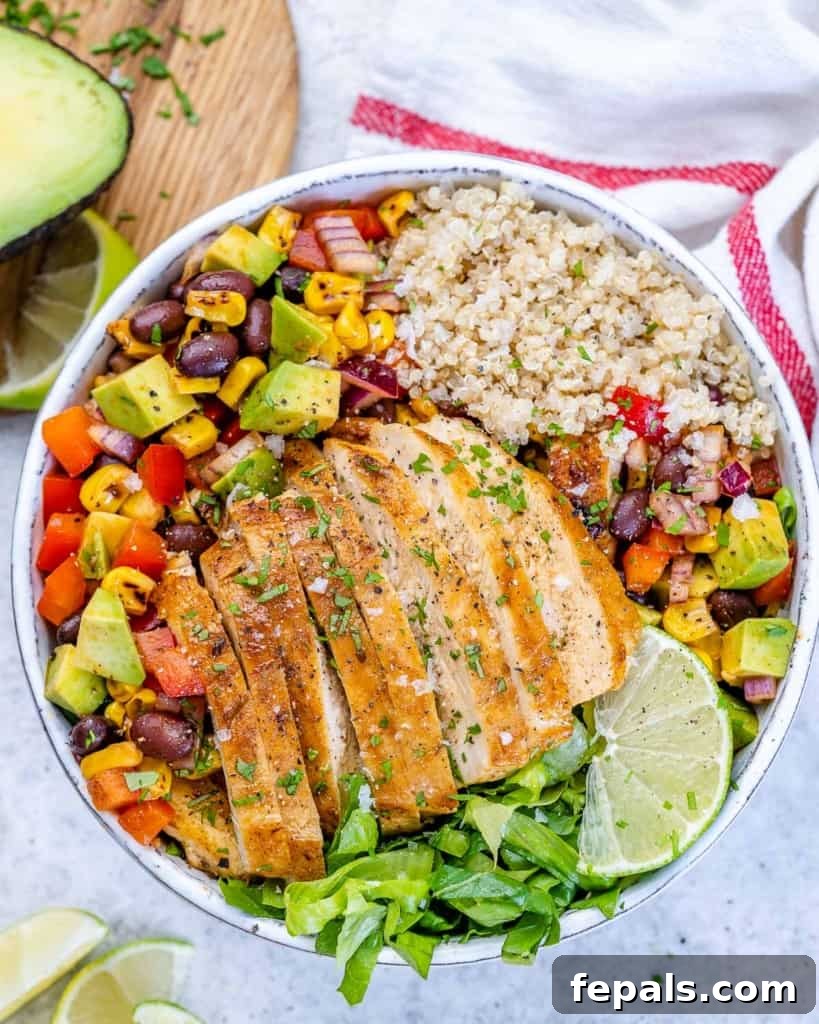 top view of quino bowl with bean salsa and sliced chicken breast