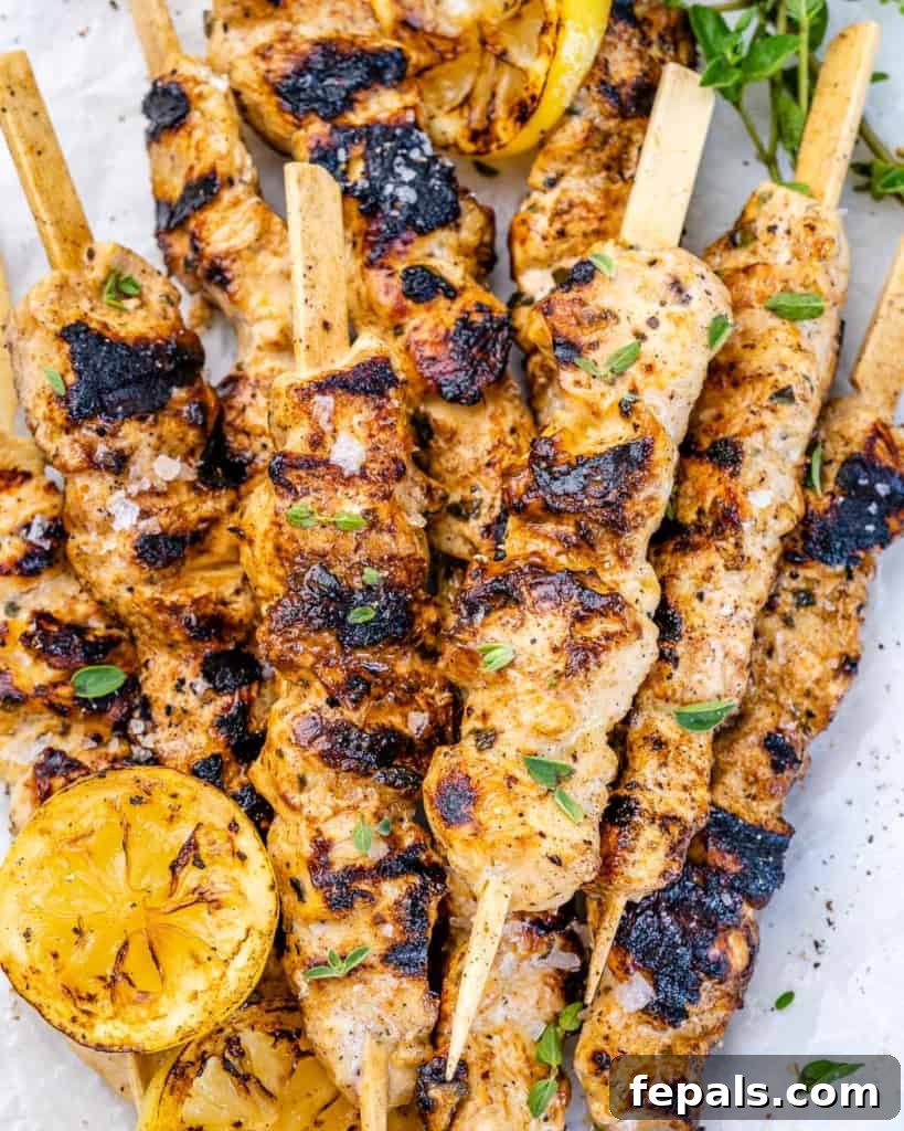 grilled lemon and pepper chicken skewers on kabobs, ready to be served