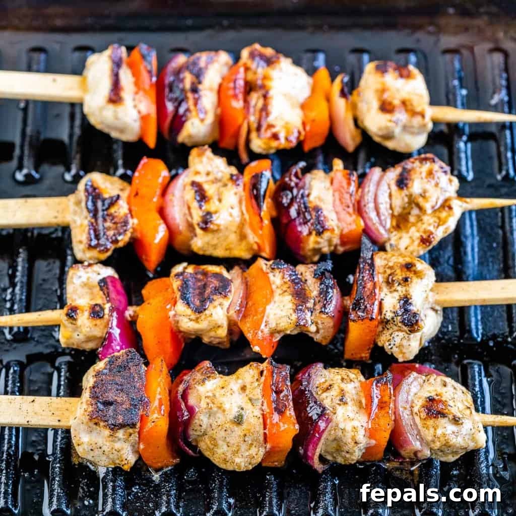 chicken skewers on a grill pan