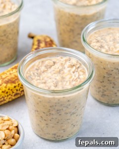Jars of overnight oats chilling in the refrigerator.