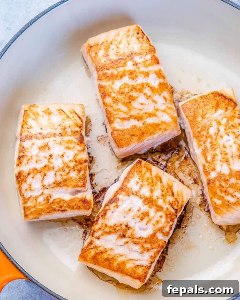 Silky Lemon Cream Salmon 5 pan seared salmon on pan
