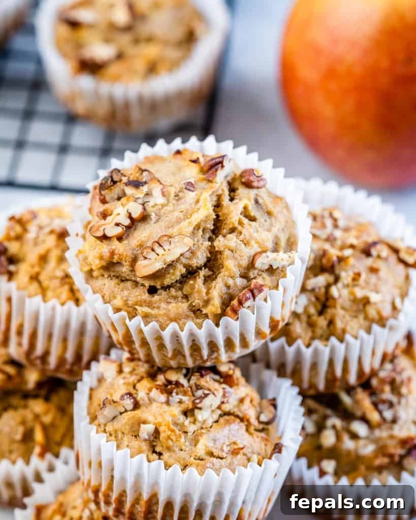 front view of pecan apple muffins in liners