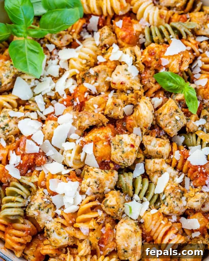 Comforting Chicken Parmesan Pasta 8 close up chicken bites with tomato based pasta