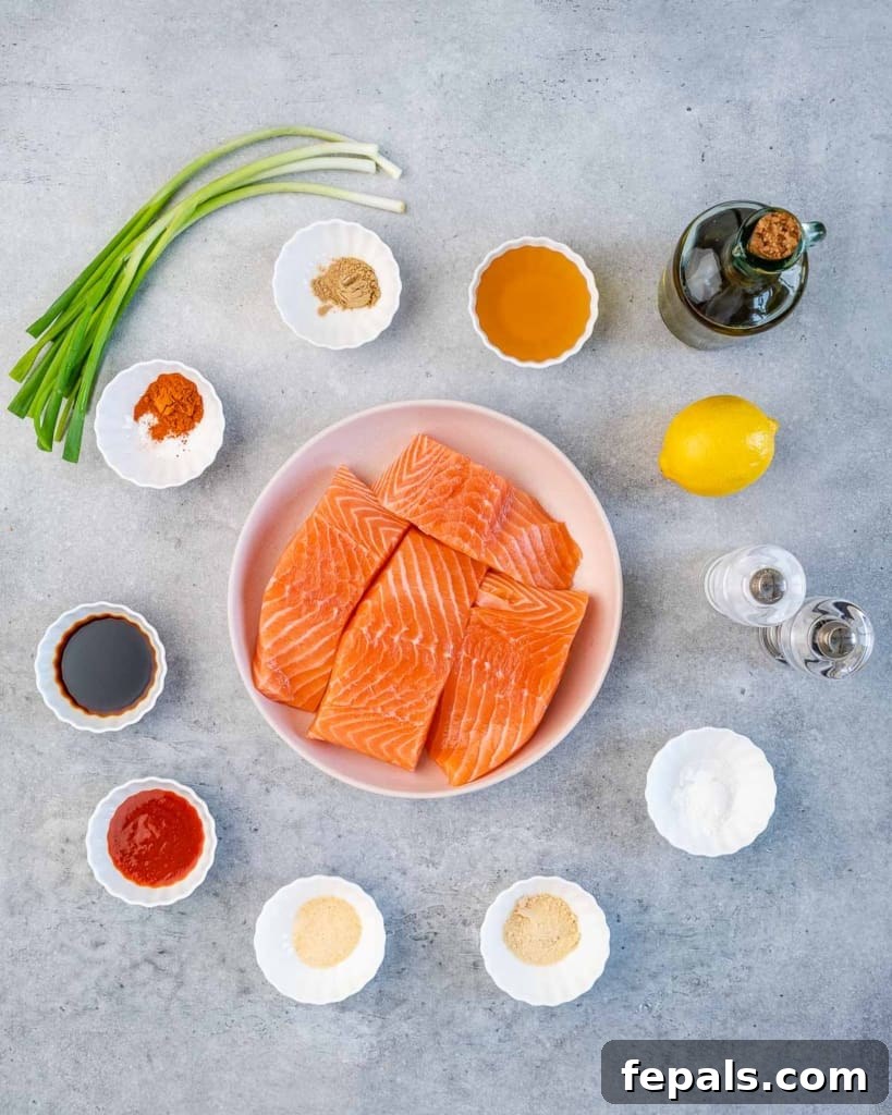 Sweet and Sticky Pan Seared Salmon 4 ingredients to make the honey glazed salmon lined up on a flat surface