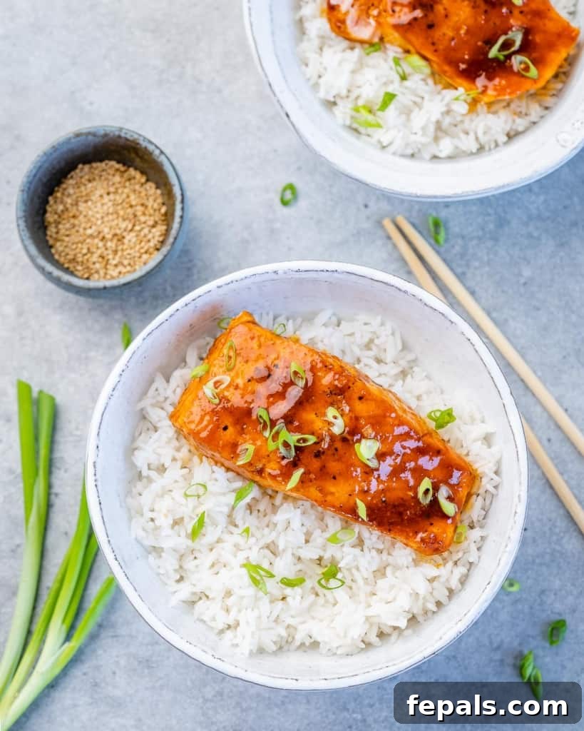Sweet and Sticky Pan Seared Salmon 10 top view of honey salmon over a bowl of rice
