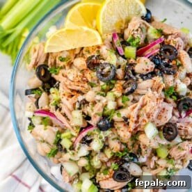Wholesome White Bean Tuna Medley 10 top view of bean and tuna salad in a clear bowl