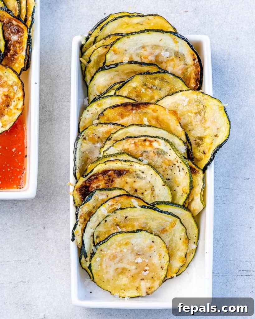 Crispy Air Fryer Zucchini Bites 11 top view of zucchini chips in a dish
