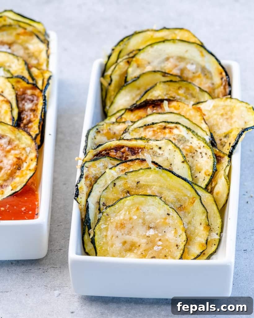Crispy Air Fryer Zucchini Bites 3 side of of zucchini chip in a white ceramic dish