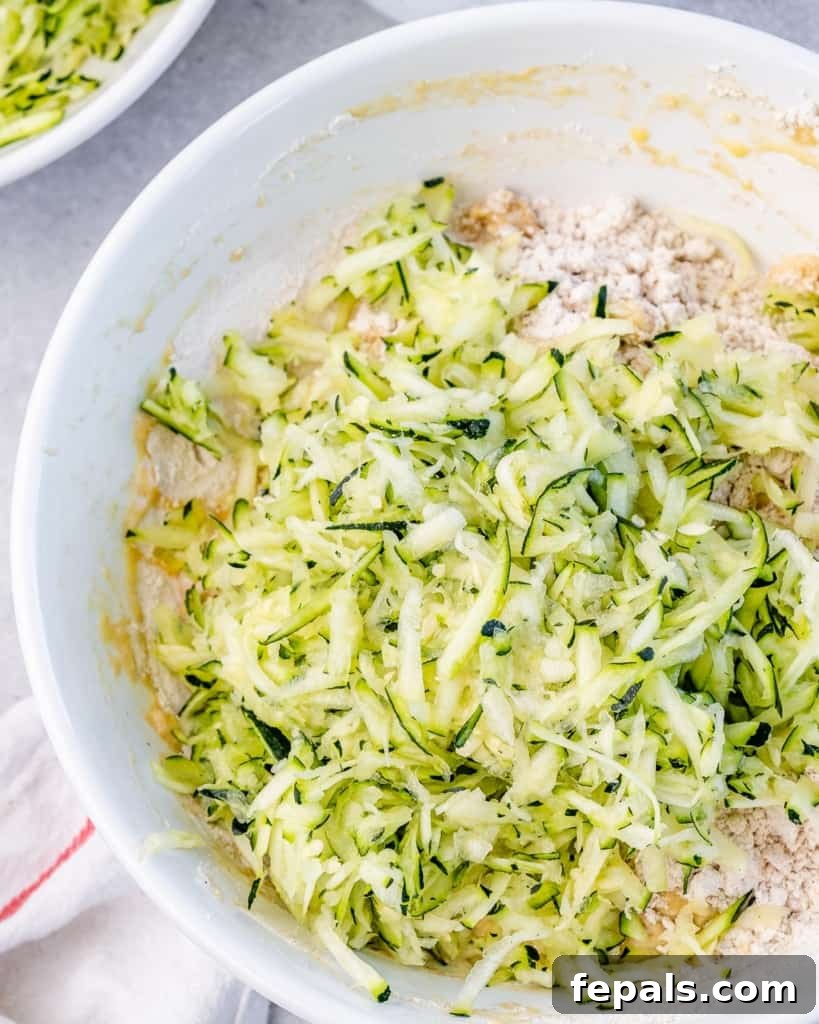 Wholesome Chocolate Chunk Zucchini Loaf 6 shredded zucchini added over batter