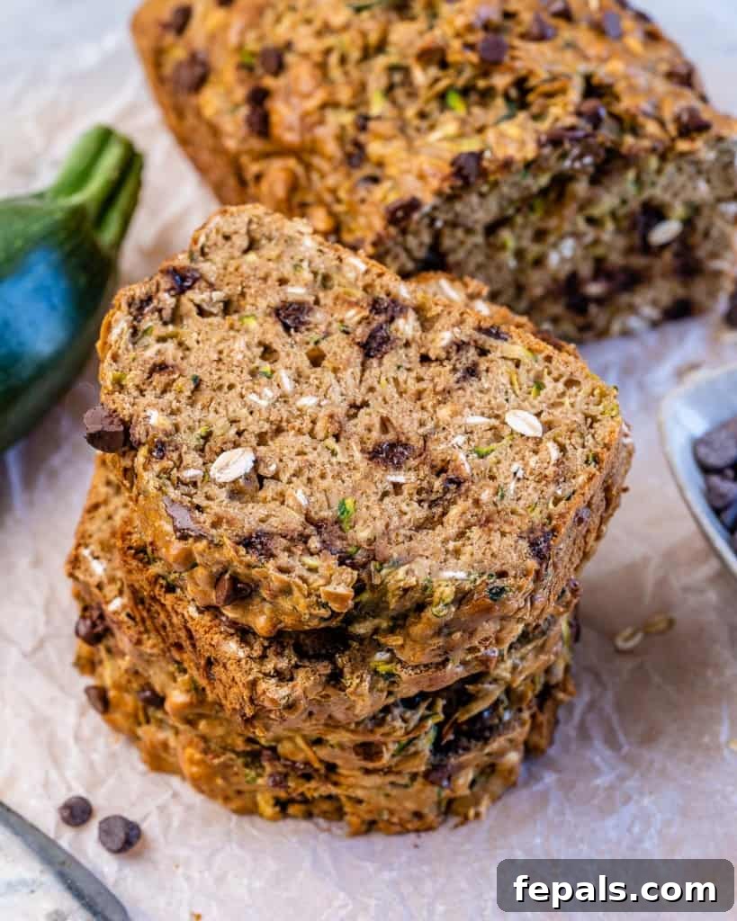 Wholesome Chocolate Chunk Zucchini Loaf 7 top view stacks of zucchini loaf bread