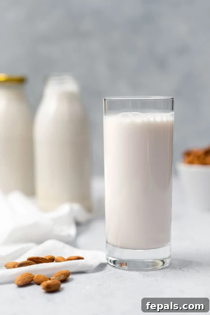 front view of glass of almond milk