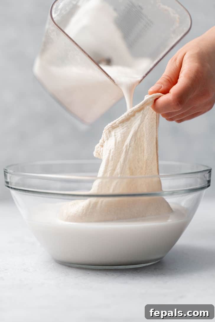 nut milk mag in bowl of almond milk