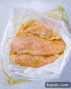 marinated chicken breast in a ziplock bag