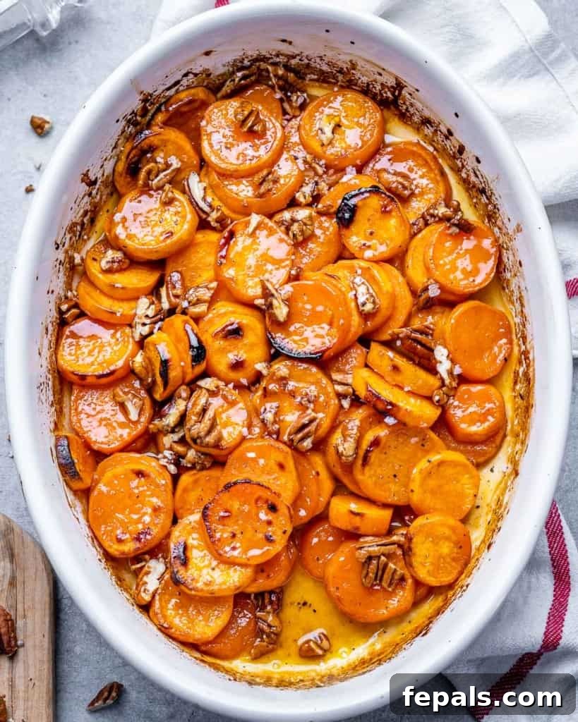 Caramelized Sweet Potato Bake 2 top view sweet potato slices in a white dish roasted