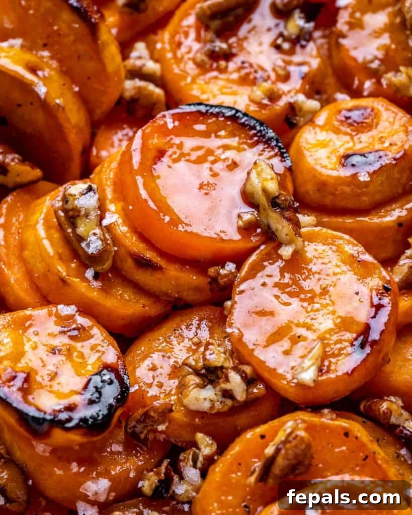 Caramelized Sweet Potato Bake 7 close up caramelized sliced sweet potatoes with pecans